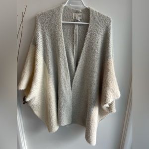 Oversized cocoon sweater from Anthropologie with pastel colours